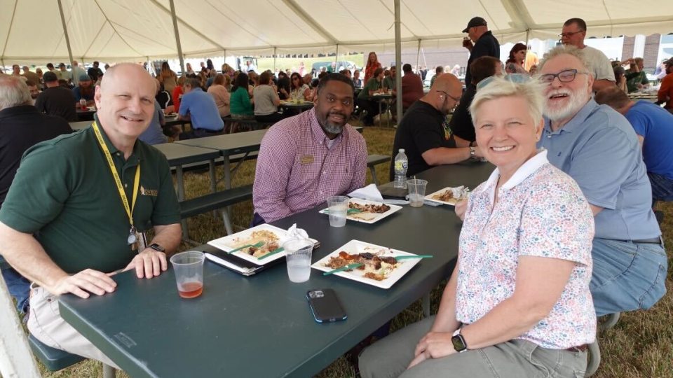 Administrators from SUNY Oswego enjoy the Campus Appreciation Barbeque
