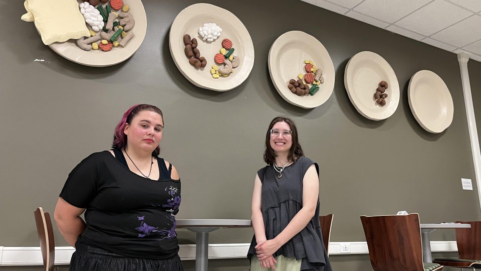 Seniors Suzan Bean and Caitlin Marx led the sculpture project titled Potluck that calls attention to the SHOP pantry's services for students in need