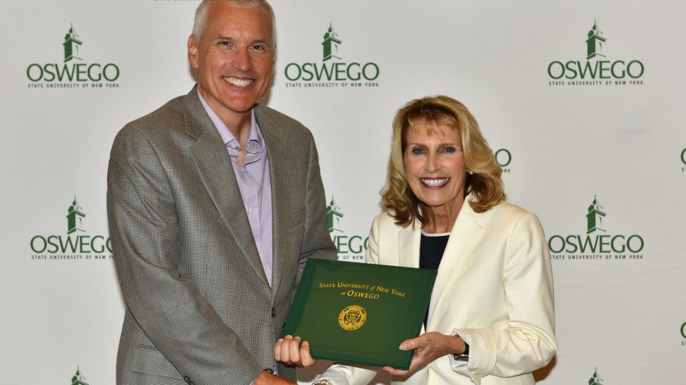 Craig DeLancey earns an award for outstanding faculty service