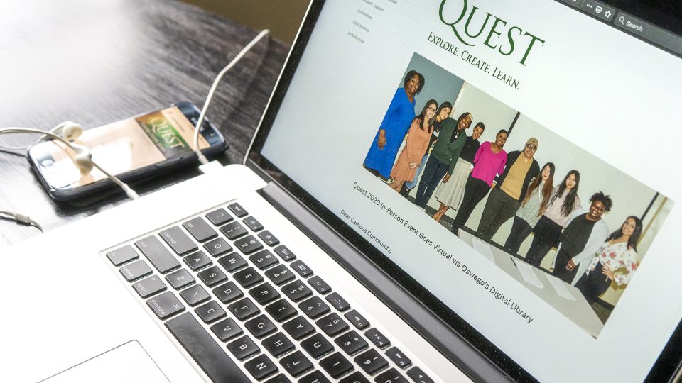 Laptop open to SUNY Oswego Quest page