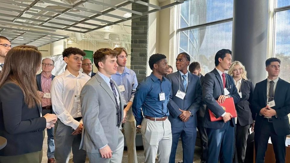 Members of the SUNY Oswego Real Estate Club gather at its well-attended 2024 conference on campus.
