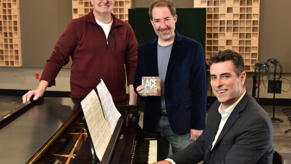Dan Wood, Eric Schmitz and Rob Auler in a recording studio