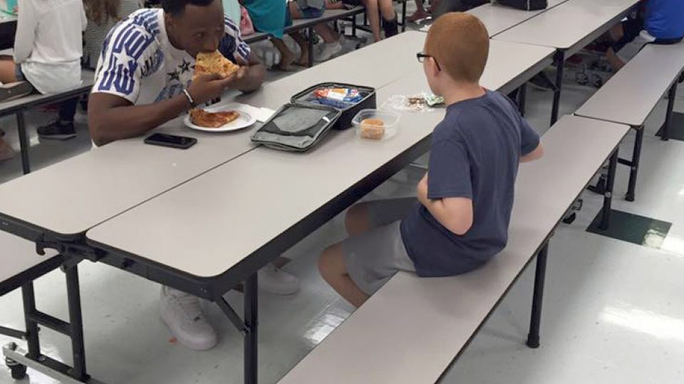 Florida State University football player Travis Rudolph chose to sit with a lone, autistic 11-year-old at lunch