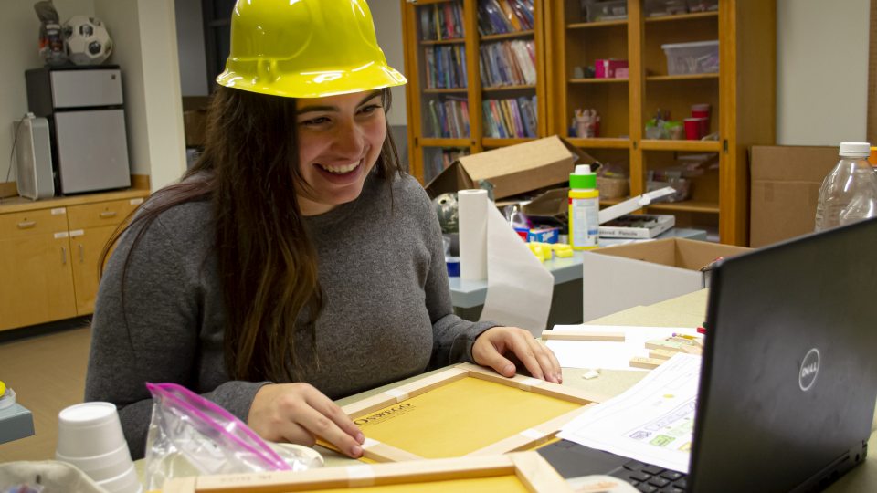 Senior technology education major Gabrielle Bloise delivers a STEM 4 Kids lesson