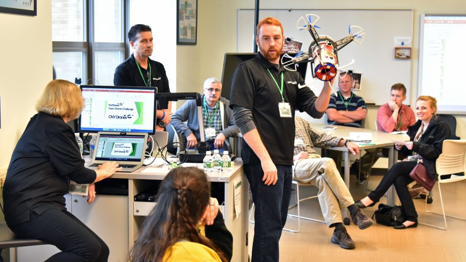 A presenter shares a creation with a previous Fall Technology Conference audience