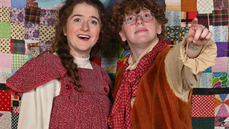 Tati Copp, left, as Winnie Foster, and Ethan Soda as Jesse Tuck, ponder immortality in SUNY Oswego's production of "Tuck Everlasting"