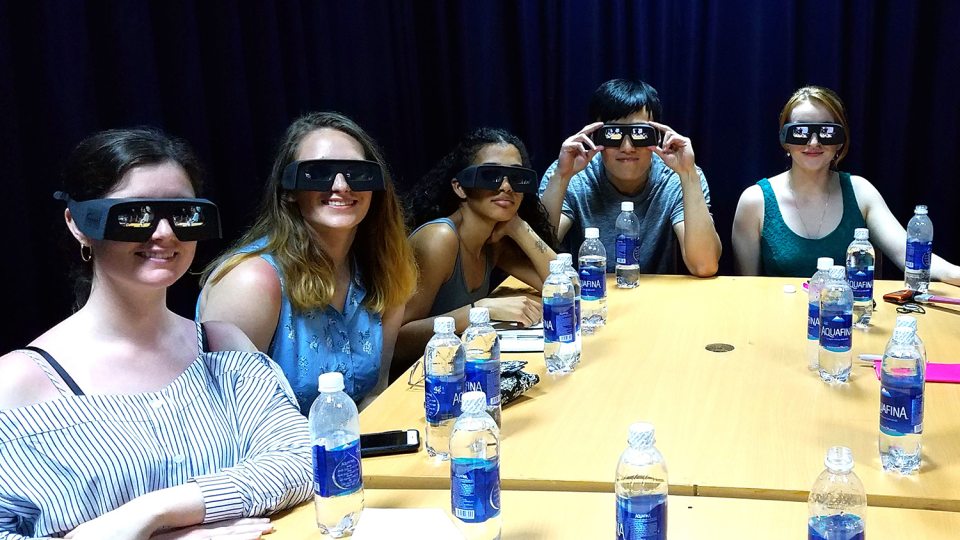 Students with virtual reality goggles