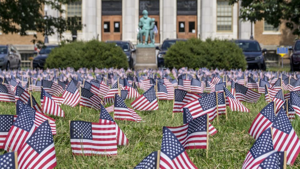 Students, veterans, first responders, faculty, staff, administrators and community members planted 2,996 flags on the front lawn of Sheldon Hall to remember every person killed in the 9/11 terrorist attacks
