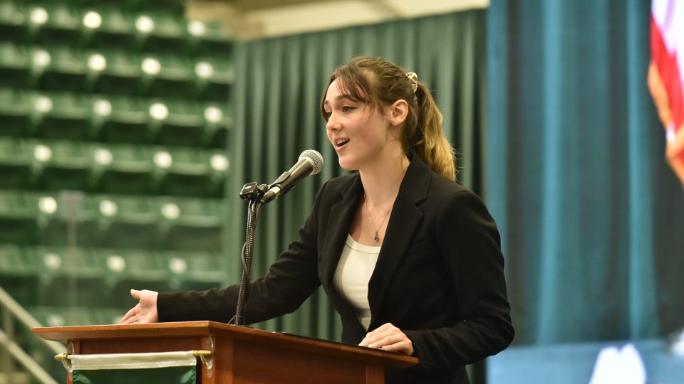 Student poet Emma Deloff speaks during President Peter O. Nwosu's Sept. 27 inauguration