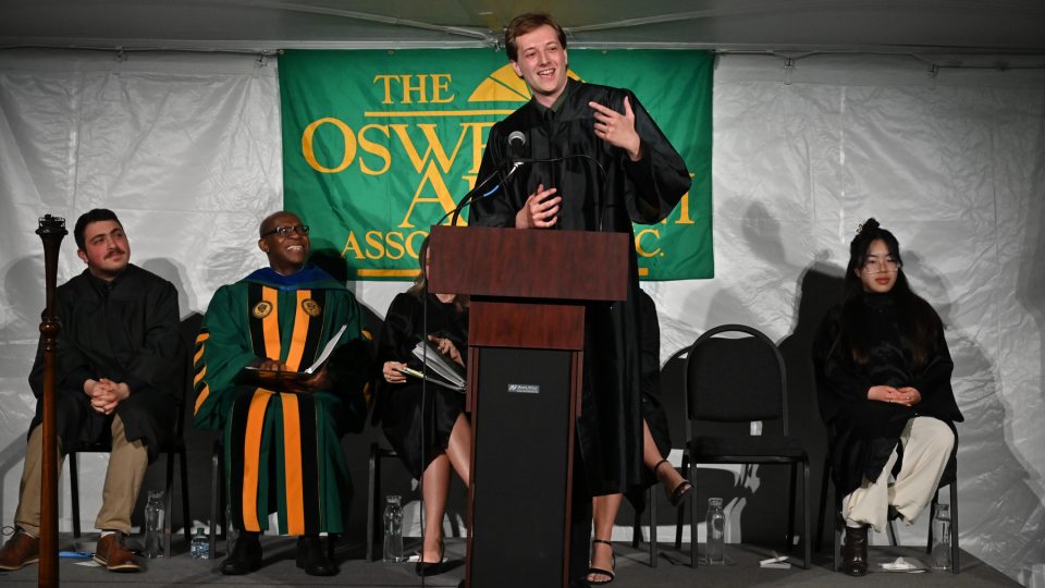 Graduating senior Jonah Hawthorne described the meaningful nature of his Oswego journey in a Torchlight speech that drew cheers, laughs and tears from those in attendance on May 15.