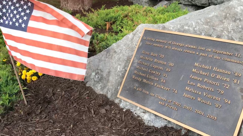 Memorial with names of 12 alumni killed in 9/11 attacks