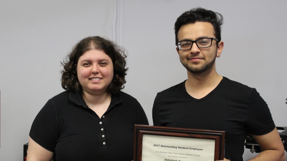 Student service award winner Abhishek Rauniyar, at right, with nominator Sharona Ginsberg