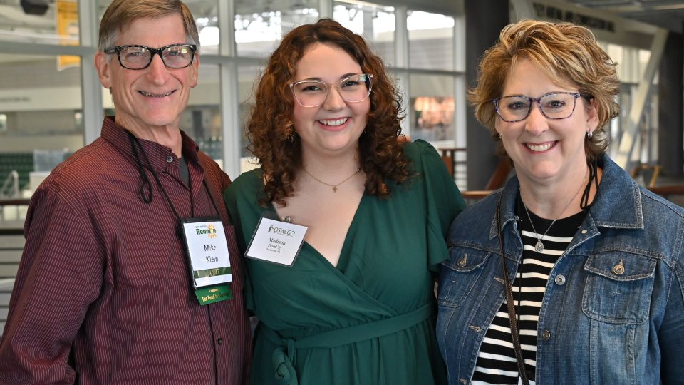 Madison Flood '25 (center) is the recipient of one of 975 privately funded scholarships and awards made possible by SUNY Oswego donors.