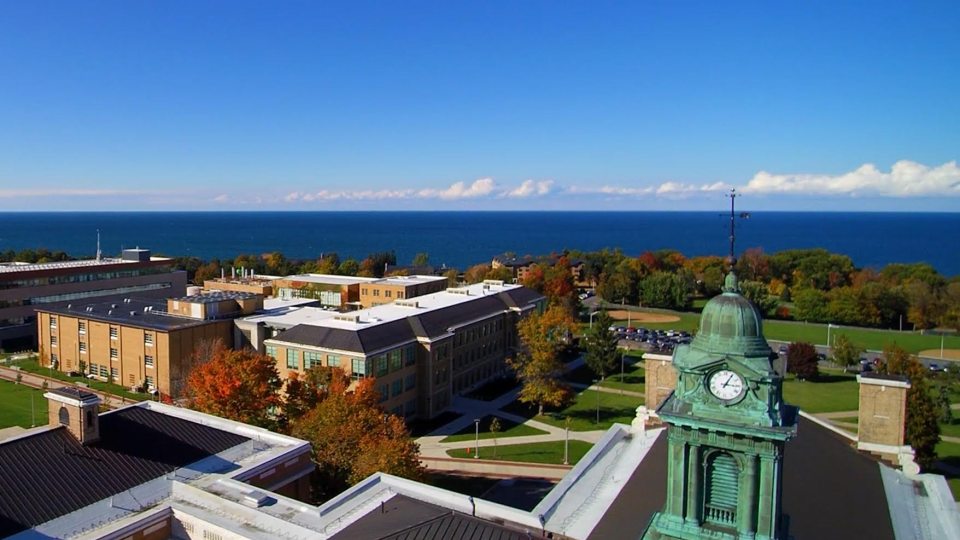 Aerial photo of SUNY Oswego campus overlooking Sheldon Hall