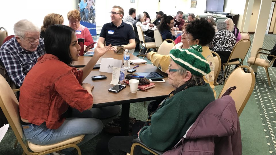 Students participate in a local community outreach effort to spend time with senior citizens at Springside at Seneca Hill and help them become more technically savvy