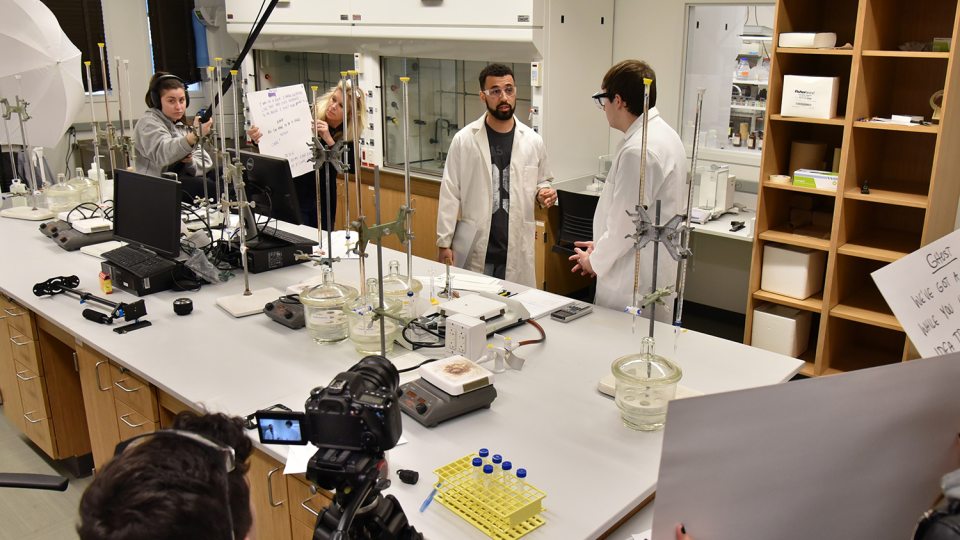 Chemistry and cinema studies students working on lab safety video