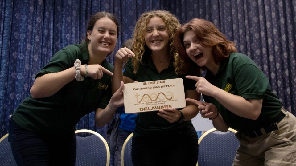 Oswego technology education students Bryleigh Beauchat, Eliza Sarigiannis and Taylor Mackowiak celebrate their win in the Technology and Engineering Education Collegiate Association Communication Challenge
