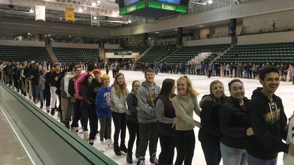 Students conga on ice