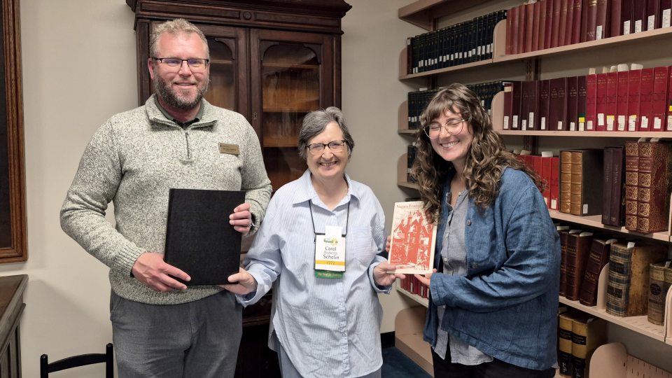 Carol Ricketts Schelin donates her late husband Bob's dissertation to Penfield Library Archives and Special Collections