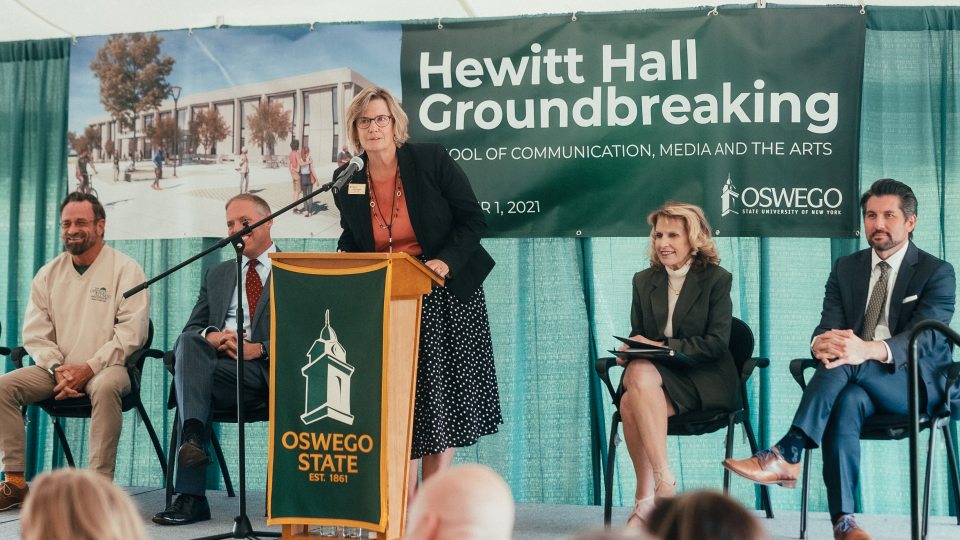 School of Communication, Media and the Arts Dean Julie Pretzat speaks at Hewitt groundbreaking
