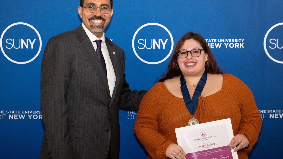 SUNY Chancellor John B. King Jr. honors Angela Aldatz with a prestigioius EOP award