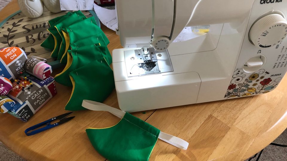 Collection of green and gold cloth masks