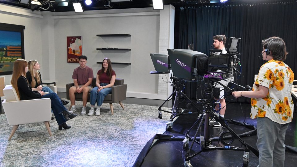 Students use a Hewitt Hall TV studio