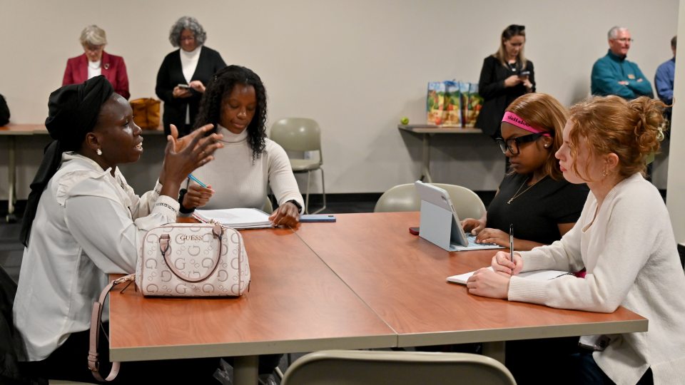 Humphrey Fellows representatives visit with members of SUNY Oswego's Cultural Environment of International Business class