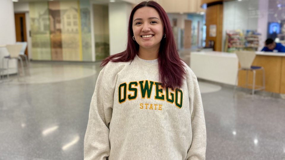 Oswego senior Tanya Hernandez stands in Shineman Center.