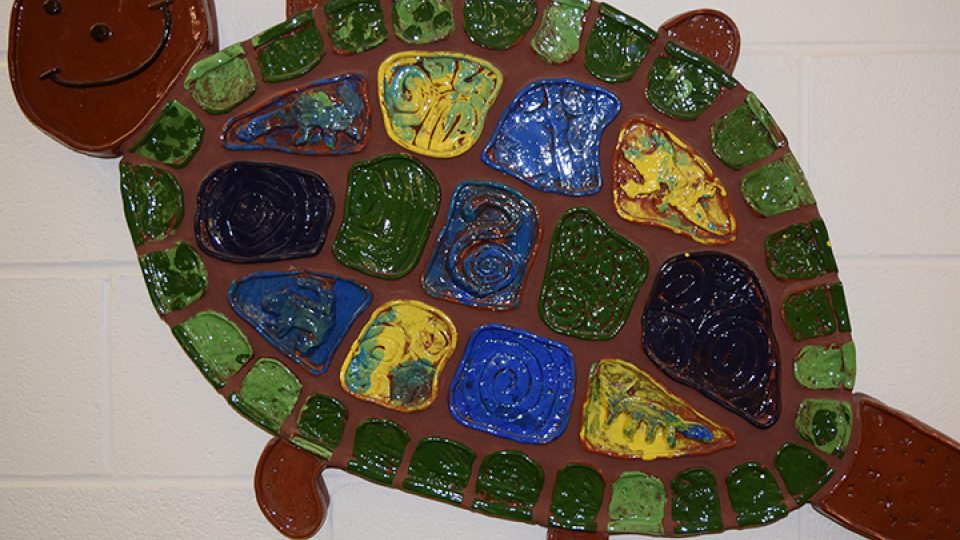 Ceramic turtle made by Jowonio schoolchild, part of exhibition