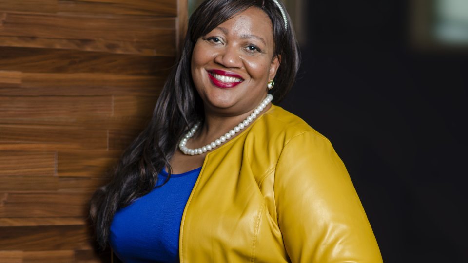 Katrina Allen-White, a principal with the Syracuse City School District who earned three education degrees from SUNY Oswego