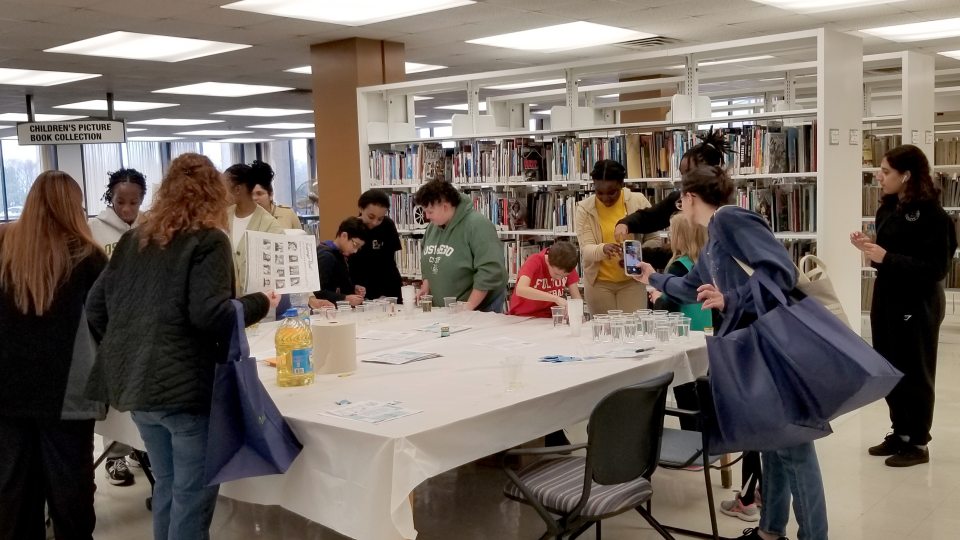 Participants in a previous Maker Madness have fun while learning about making things