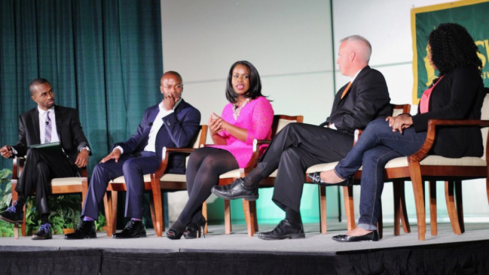 Media Summit panelists on stage during discussion
