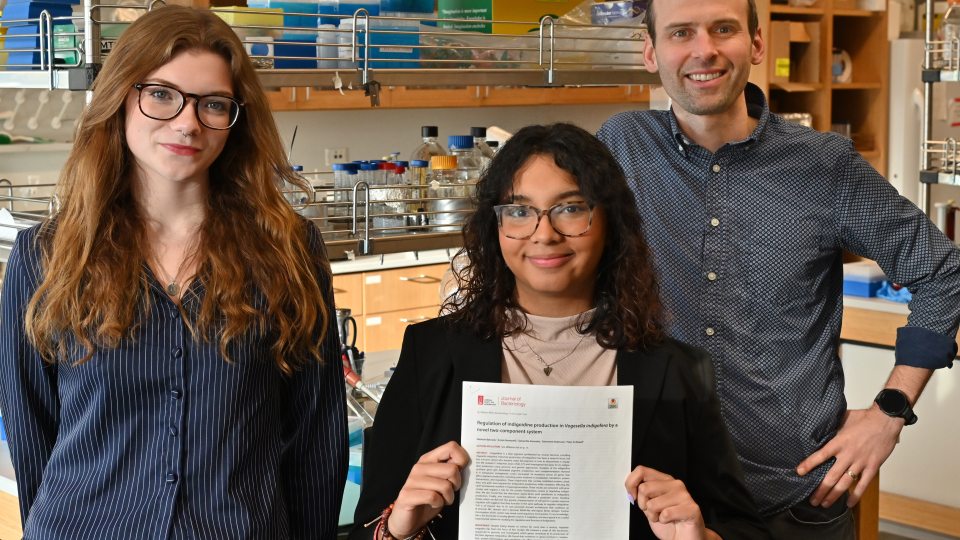 Peter Newell of the Biological Sciences Department and student researchers recently published their groundbreaking work with a unique bacterial species known as vogesella indigofera in the Journal of Bacteriology.