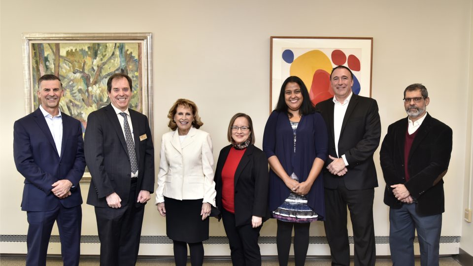 Administrators from Novelis and SUNY Oswego gather to celebrate the company's donation of $150,000 to SUNY Oswego to endow two scholarships for SUNY Oswego students with financial need.
