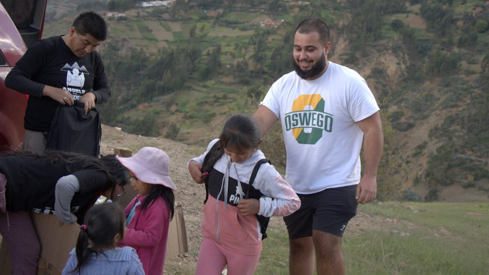 May 2024 SUNY Oswego graduate Zachary Nusimow helps distribute supplies and more to families in the Andes Mountains of Peru