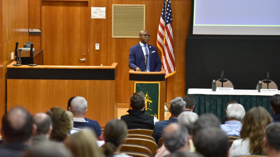 SUNY Oswego President Peter O. Nwosu, who chairs the Oswego County Micron Strategy Steering Committee, welcomes attendees to the committee's inaugural annual summit.