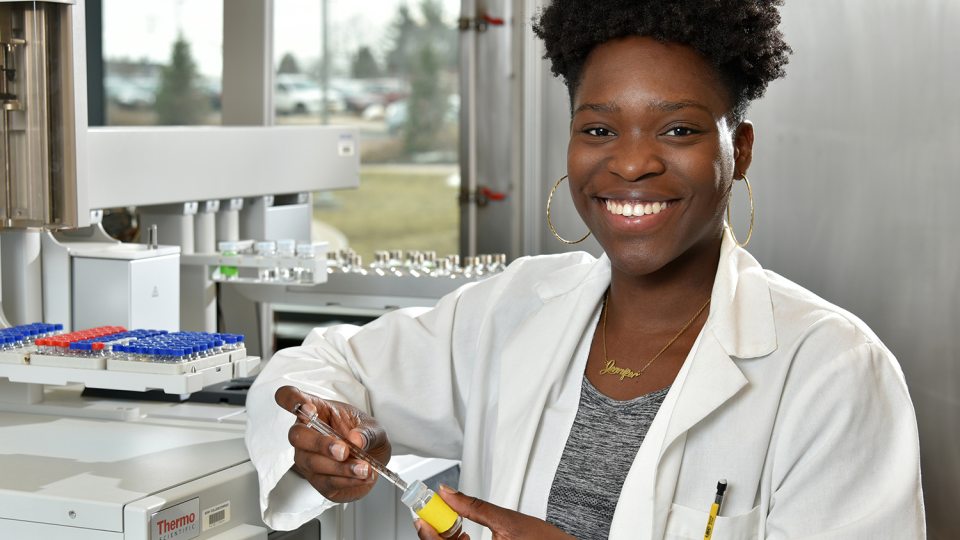 Jennifer Ofodile in a biochemistry lab