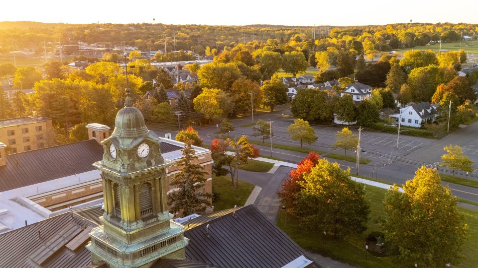 Sun reflecting off of Sheldon Hall facing south into the adjoining neighborhood