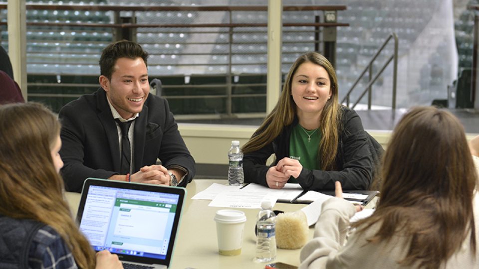 Students at a round table for Oz Leads