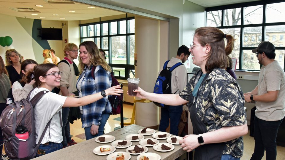 Customers line up at Rich and Pour Café in Rich Hall