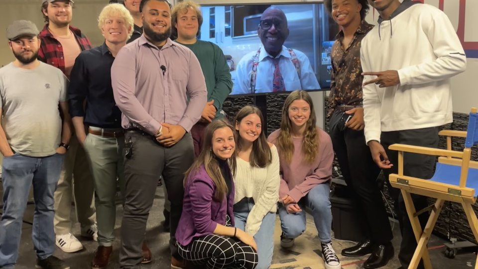 Students on set of OX5 with Al Roker in background on screen