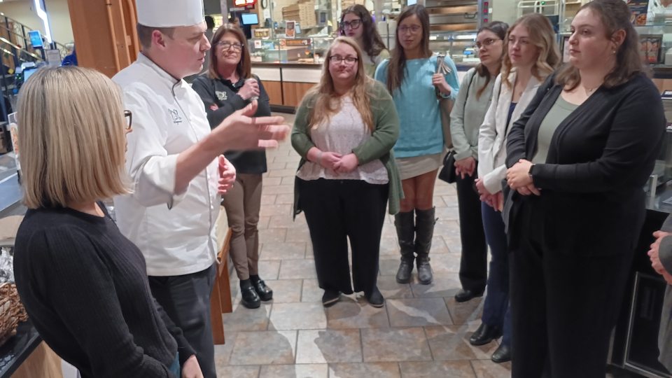 Society of Human Resource Management club members on a field trip to Wegmans' flagship store in Rochester