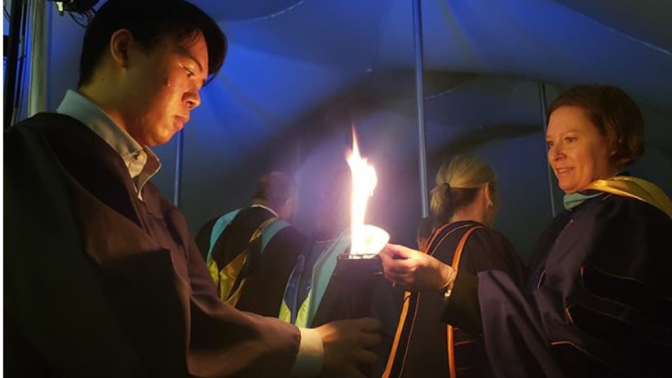 Symbolic passing of the Torch of Knowledge for Torchlight