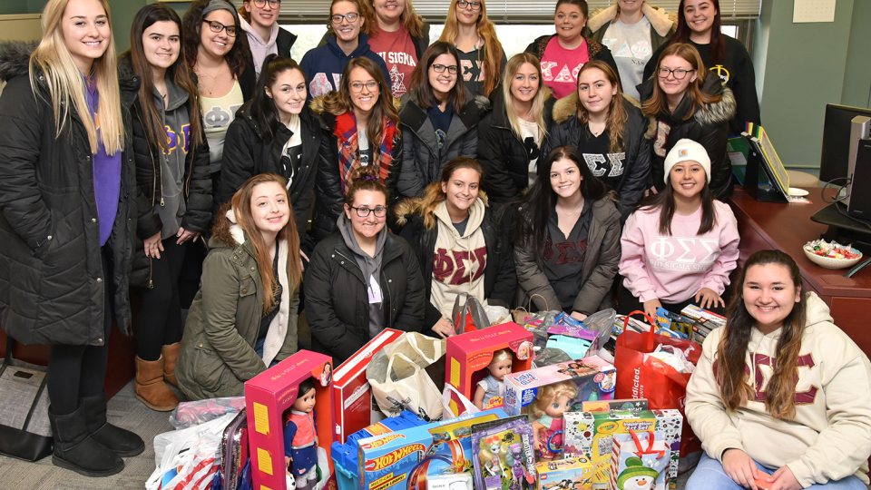 Sororities collected gifts and canned goods for the community