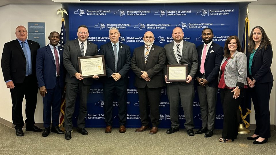 State and SUNY Oswego official celebrate University Police's recent accreditation