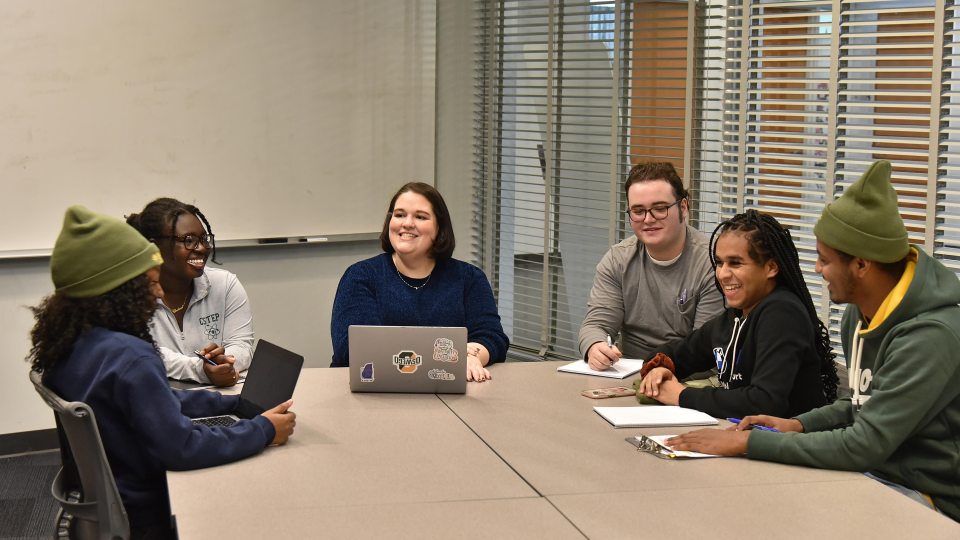 Christina Vasquez meets with students