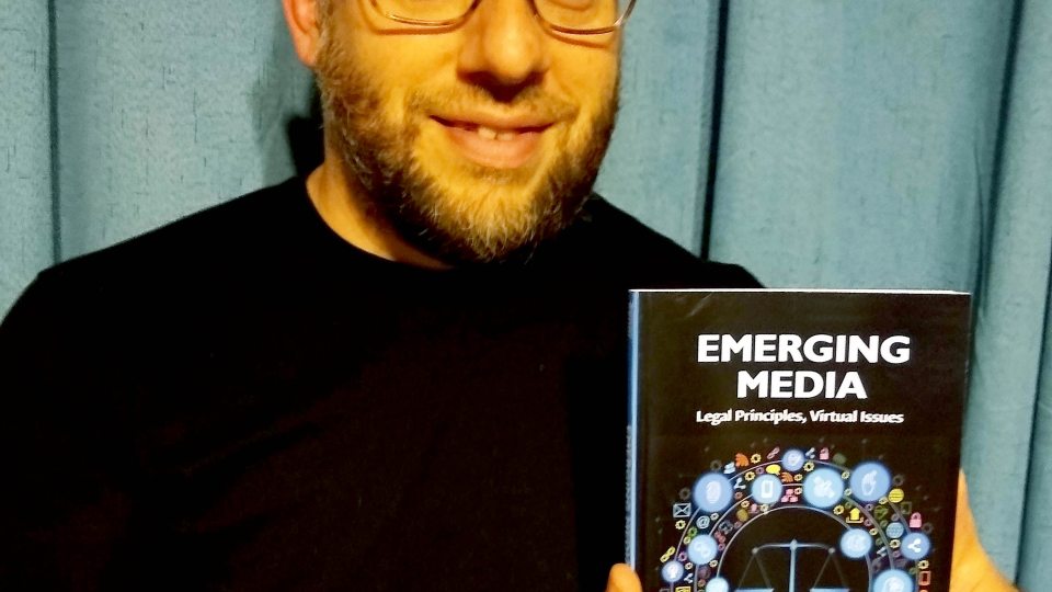 Jason Zenor with book about emerging issues in media law