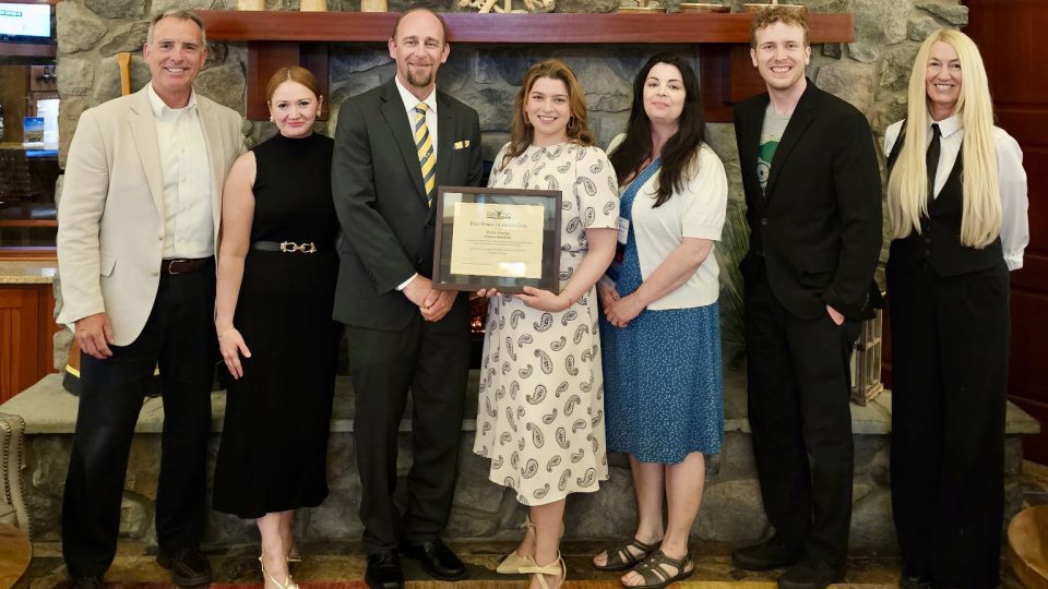 Career Services staff members celebrate award