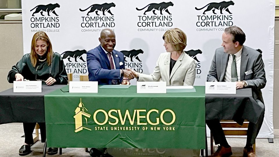 Signing new agreements to enhance student transfer opportunities from Tompkins Cortland Community College (TC3) to SUNY Oswego are, from left, SUNY Oswego Provost Kate Pechenkina, SUNY Oswego President Peter O. Nwosu, TC3 President Amy Kremenek and TC3 Provost Aaron Tolbert. The ceremony took place Sept. 9 on TC3's Dryden campus.